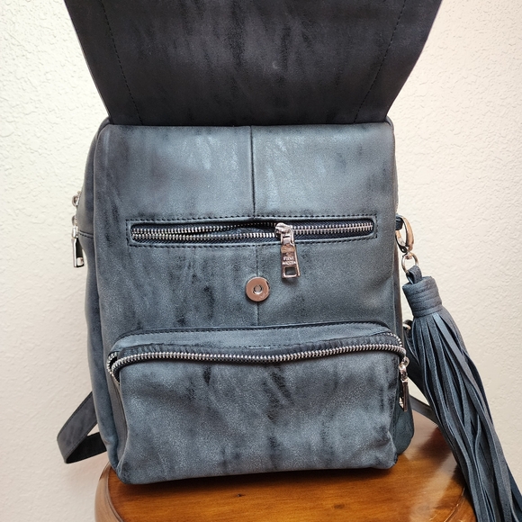 Steve Madden Tassel Backpack